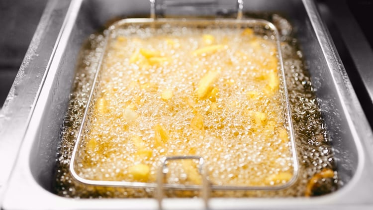Shelf-life enhancement of oils in deep frying conditions